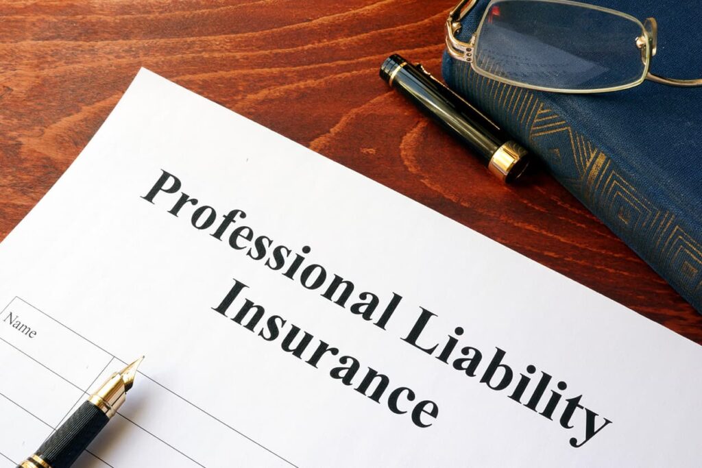 A close up of a document that says professional liability insurance